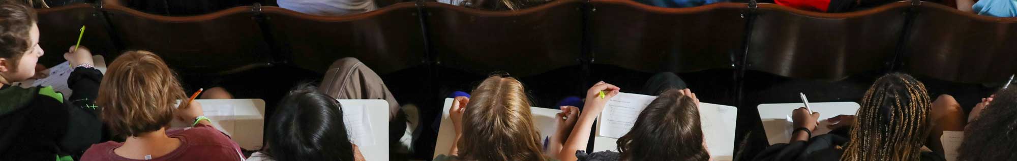 photograph of people notetaking